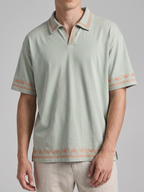 Embroidered Polo Tee — Unisex Relaxed Fit