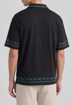 Embroidered Polo Tee — Unisex Relaxed Fit