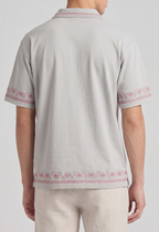 Embroidered Polo Tee — Unisex Relaxed Fit