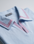 Embroidered Polo Tee — Unisex Relaxed Fit